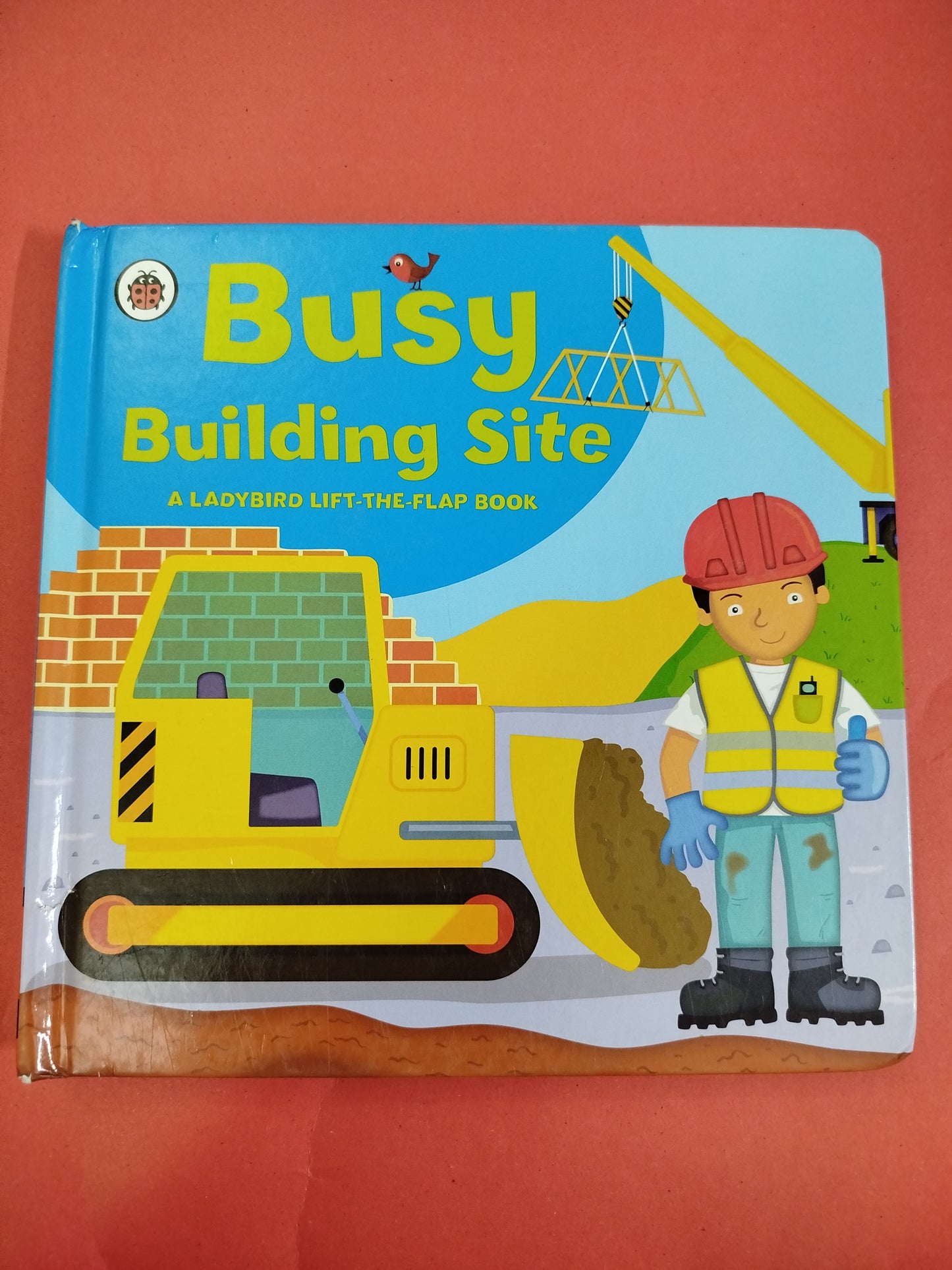 Busy Building Site - lift the flap book - ladybird