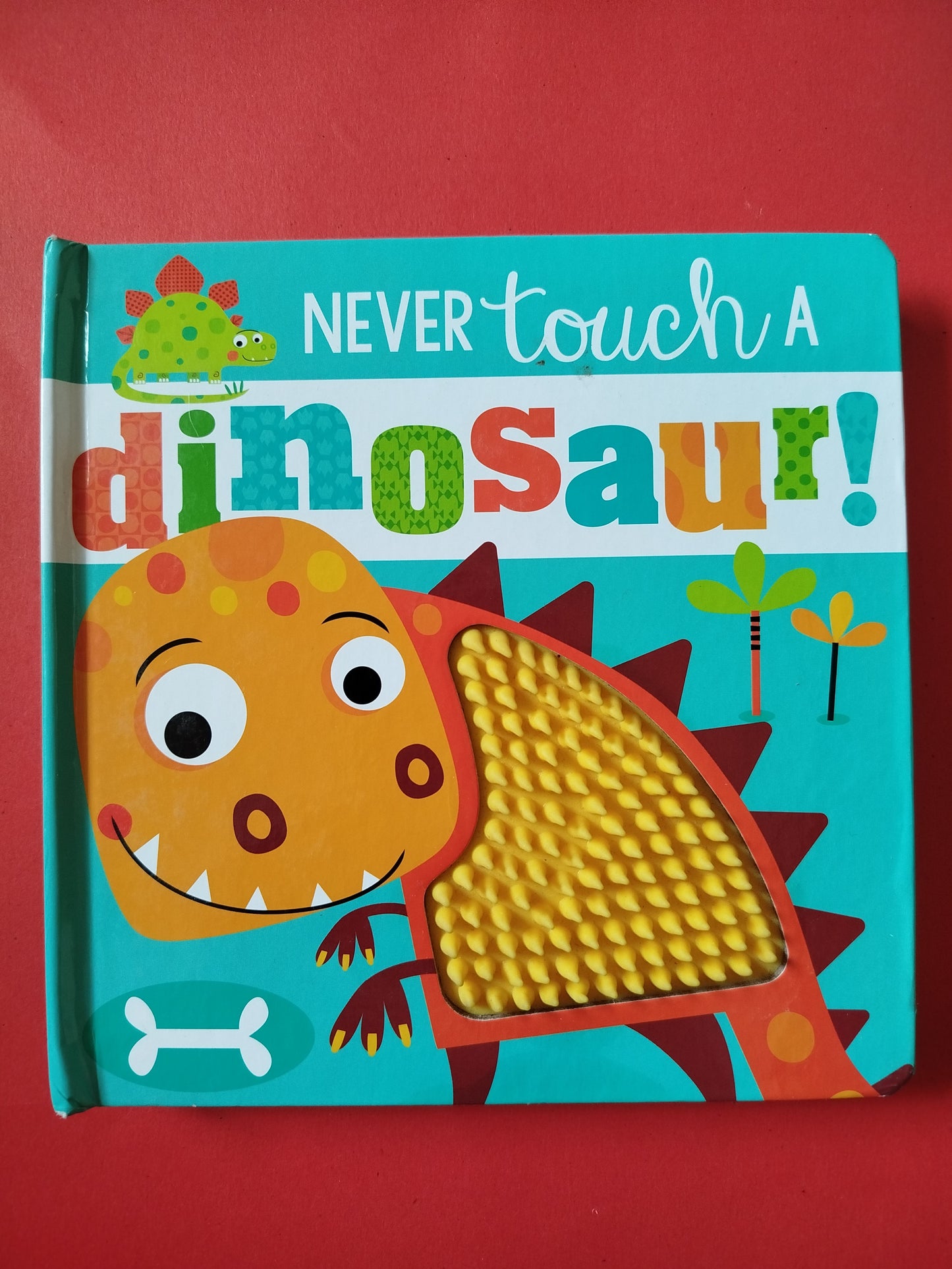 Never touch a Dinosaur - Touch and Feel Board Book